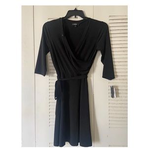 New! Black dress , classic, knee length.